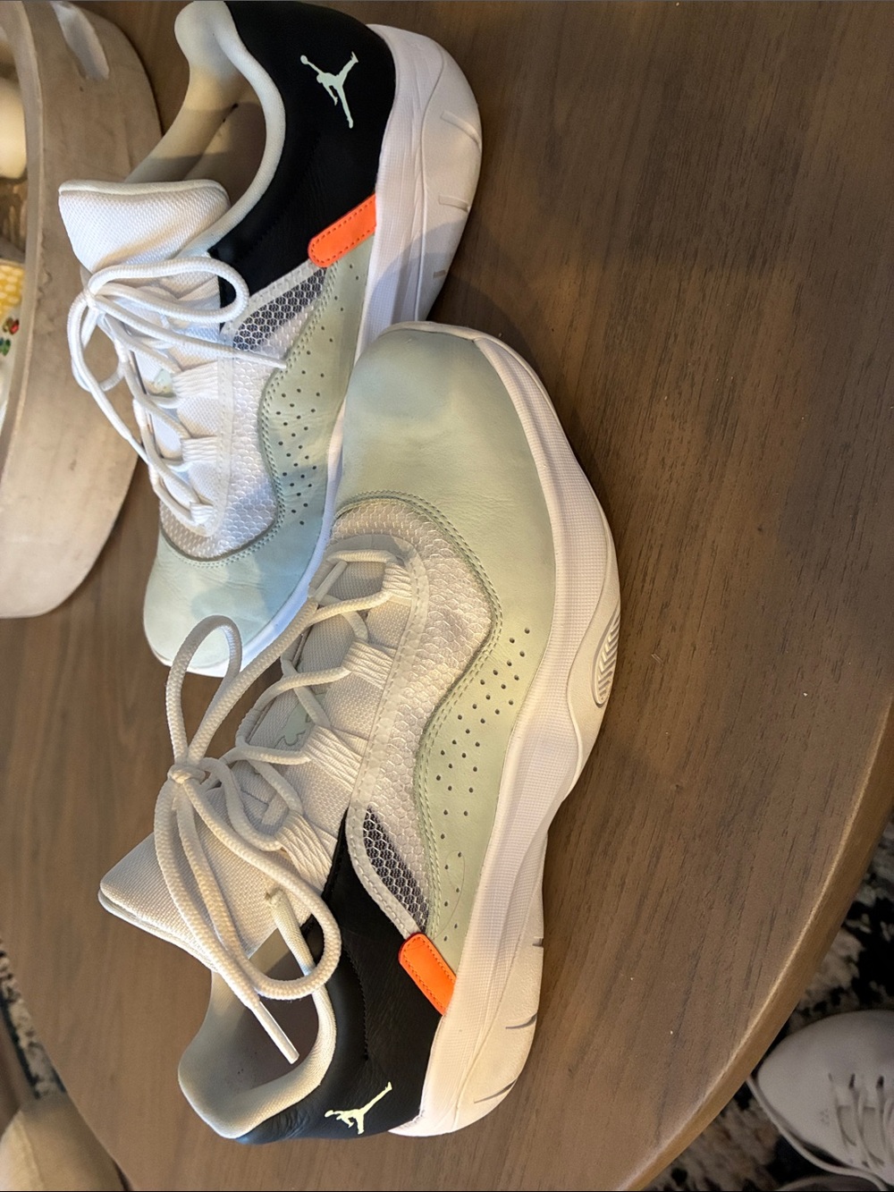 Jordan men’s White, Light Green & Black Low-Top Sneakers with Orange Tab